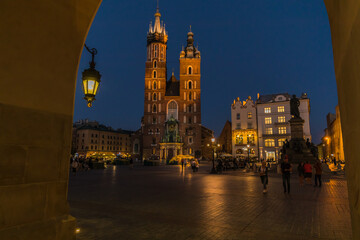 Fototapeta na wymiar Night photos of the market square in the old town with St. Mary's Basilica.Krakow, old town.Poland.