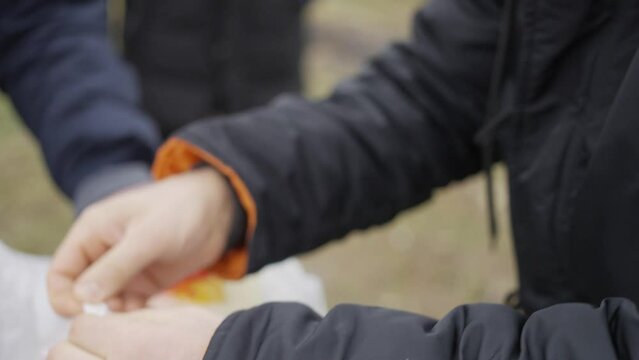 Men went on a picnic in early spring, close-up of the face of a man