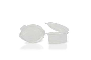 Small plastic sauce container with open lid on a white background