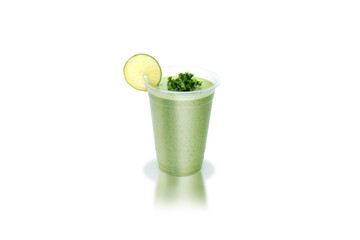 Plant based smoothie in a plastic PET drinking cup on a white background