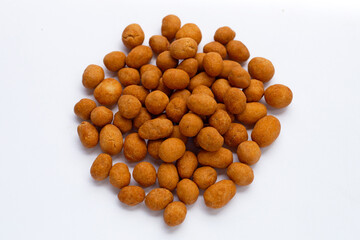 Crispy peanut snack balls on white
