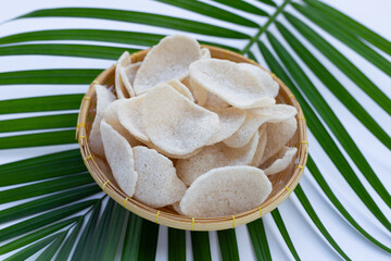 Prawn crackers in bamboo basket. Shrimp crispy rice snack