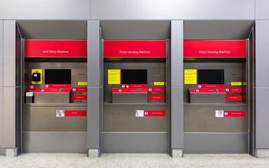 Set of ticket and add value vending machines with touch screens in the subway train station system for automatic passenger card sales