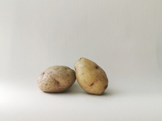 Fototapeta premium Potatoes on a white background.