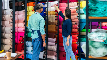 brazilian customer asking information about fabrics to sales person inside store