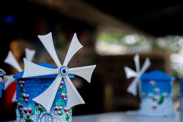 Small blue and white windmill figurine. They sell as souvenirs.