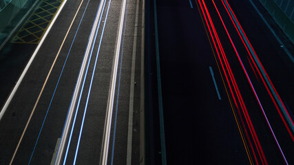 Light trails from above on a route, round trip.