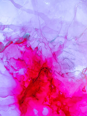 Background texture of alcohol ink in red color.  Abstract fire paint with drops and stains.