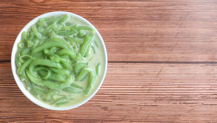 Lod Chong from Thailand It is pandan leaf vermicelli in coconut milk, a Thai dessert. on the wooden...