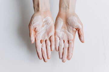 Fototapeta premium Soap hands in foam beauty health on a white background isolated