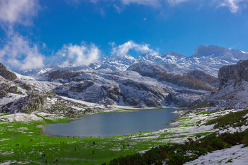 Lakes of Covadonga in Asturias with snowy mountains