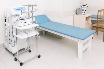 Hospital diagnostic room. Modern medical equipment, preventional medicine and healthcare concept. Modern hospital laboratory. Treatment room. Physiotherapy. Doctor office interior.