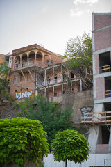 Fototapeta na wymiar beautiful house with balconies on a cliff in Tbilisi