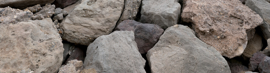 stone wall of breakwater in a harbor
