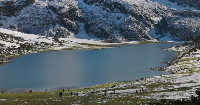 Lakes of Covadonga in Asturias with snowy mountains