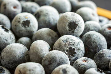 frozen ripe blueberries closeup background