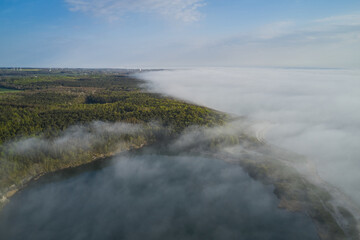 fog over the ocean hitting the shore in denmark