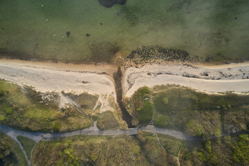 fog over the ocean hitting the shore in denmark