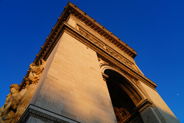 View of the landmarc Arc de Triomphe monument on the Champs-Elysees in Paris, France