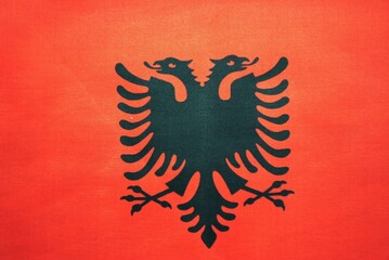 National flag of the state. Material surface texture