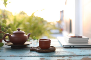 Asian teapot and tea cup