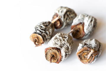 Dried, dried persimmon on a white background.