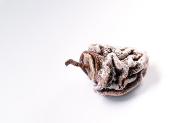 Dried, dried persimmon on a white background.