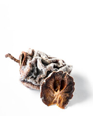 Dried, dried persimmon on a white background.