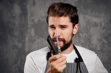 sexy hairdresser with comb and scissors fashion man beard model