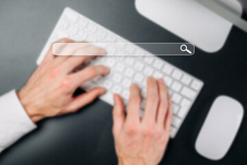 Searching online. Internet web search engine selective focus. Blured fingers touching computer for web surfing, find websites, looking for information concepts.