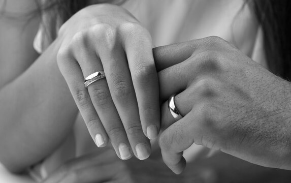 picture of man and woman with wedding rings