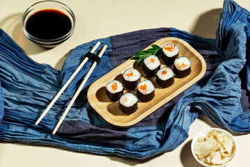Fish food - sushi, on a bright colored background.