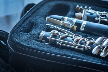Naklejka premium clarinet inside musical instrument storage case closeup