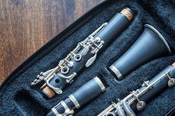 Naklejka premium clarinet inside musical instrument storage case closeup