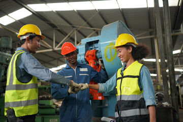 Industrial Engineers in Hard Hats.Work at the Heavy Industry Manufacturing Factory.industrial worker indoors in factory. man working in an industrial factory.