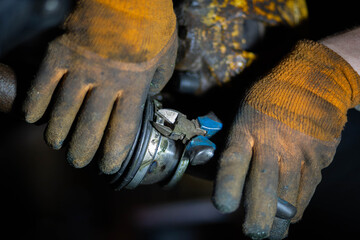 installation of the CV joint on the drive of the car, tightening the clamp on the rubber boot.