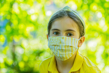 Little girl with mask