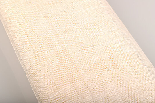 Sinamay fabric is a versatile basic fabric used in hat making. It is woven from the fibers of the Abaca tree found in the Philippines.