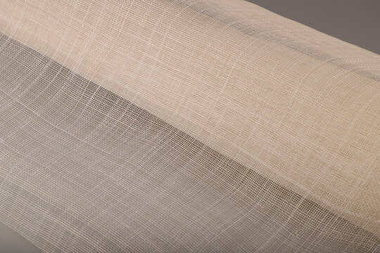 Sinamay fabric is a versatile basic fabric used in hat making. It is woven from the fibers of the Abaca tree found in the Philippines.