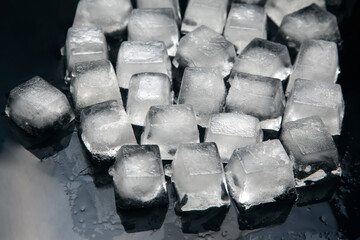 frozen pieces of ice on a dark background
