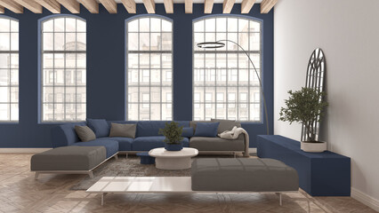 Modern living room in vintage apartment in beige and blue tones with big old window, sofa with pillows, carpet, table. Classic parquet floor, wooden roof beams, interior design idea