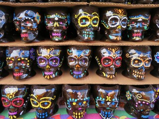 souvenir skull cups in a market in Mexico