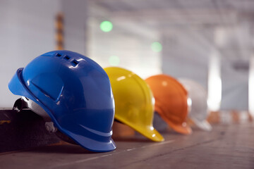 Multicolored Safety Construction Worker hardhat. Teamwork of construction team must have quality....