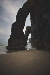 two stone arches in the sea