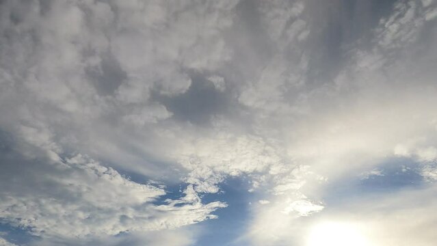 Bright sun light ray n dark storm cloud on sky line