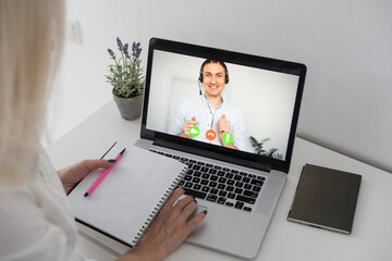 Psychological consultation online - man lists his problems - communicates with the patient using the digital technology - remote psychodiagnosis session