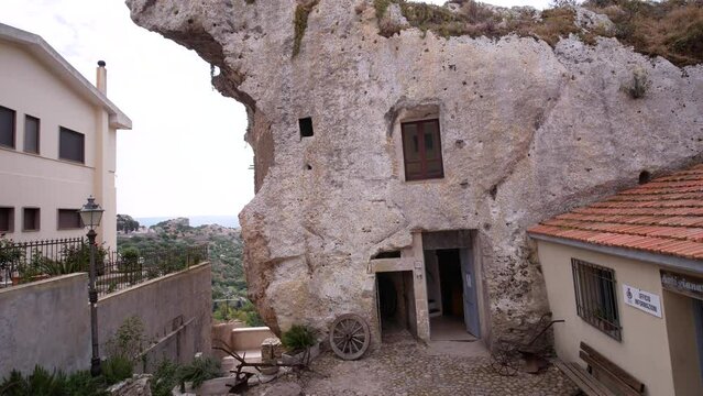 Sedini, Sassari, Italy, Europe - July 2 2021: Domus de Janas, the house in the rock or house of fairies, an extraordinary example of pre-Nuragic architecture in the Anglona region in Sardinia.