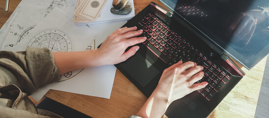 Astrology. Astrologer calculates natal chart and makes a forecast of fate Tarot cards, Fortune...