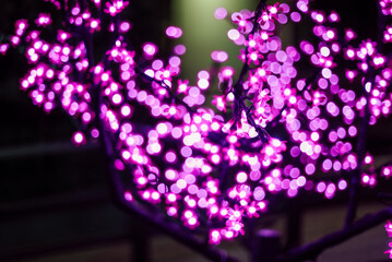 Abstract image out of focus lights in the city or Night Light pink tone