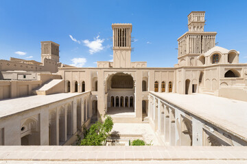 Fototapeta premium Courtyard of the castle Aghazadeh Mansion and wind catcher, Abarkook, Yazd Province, Iran